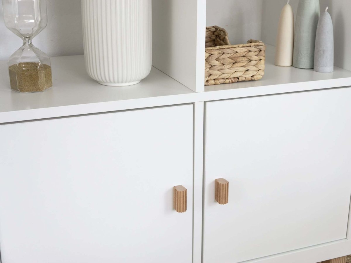 ikea kallax with door insert with wooden cabinet knobs with a ribbed design
