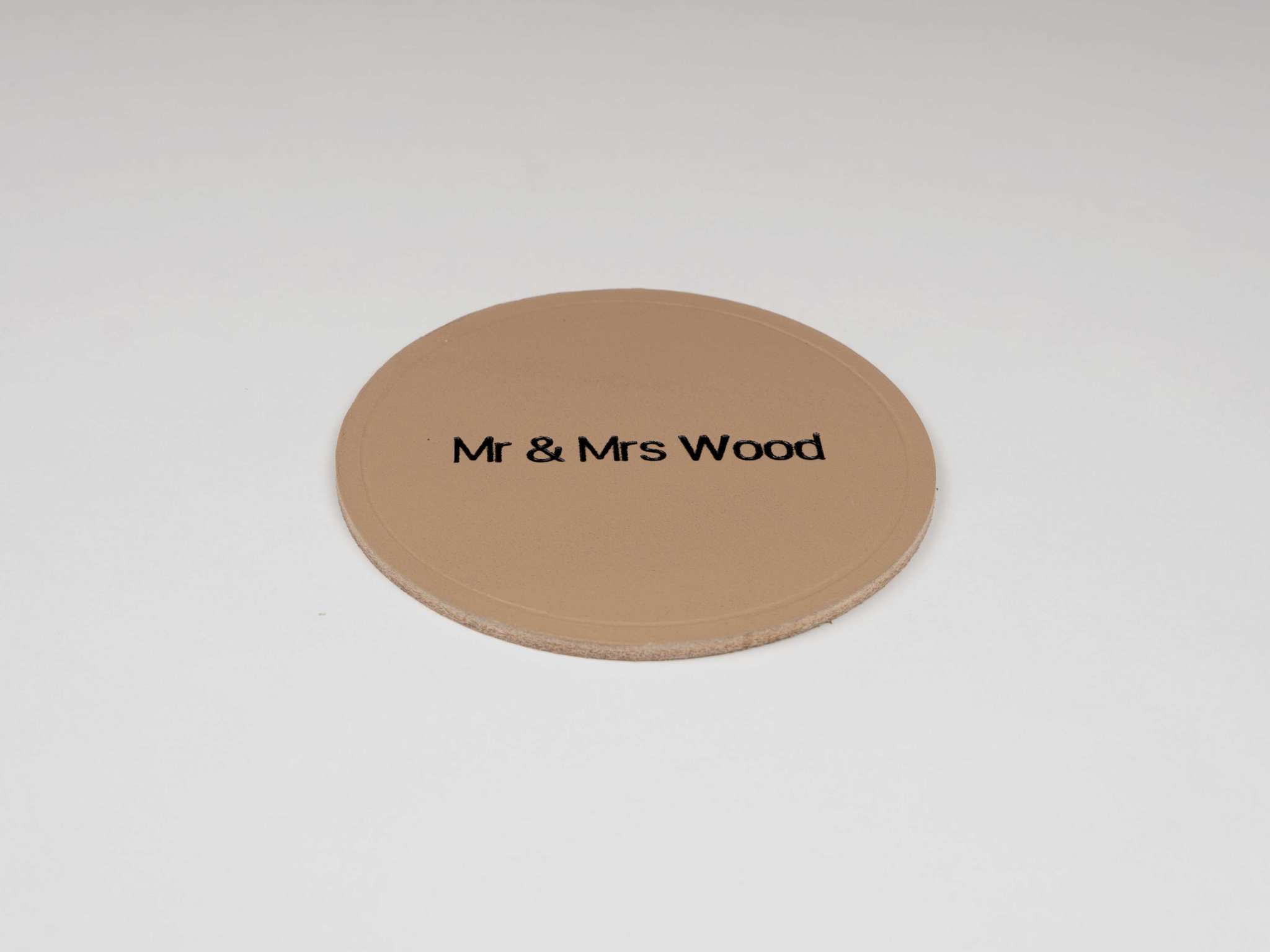 zwarte gegraveerde leren onderzetter