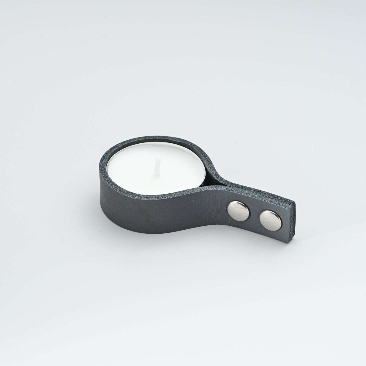 Minimalist leather candle holder for tealight candles with straight ends and metal rivets