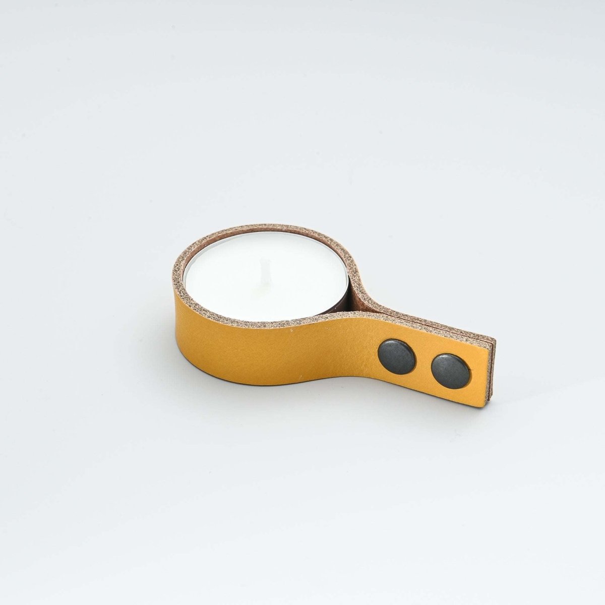 minimalist leather candle holder for tealight candles with straight ends and snap buttons