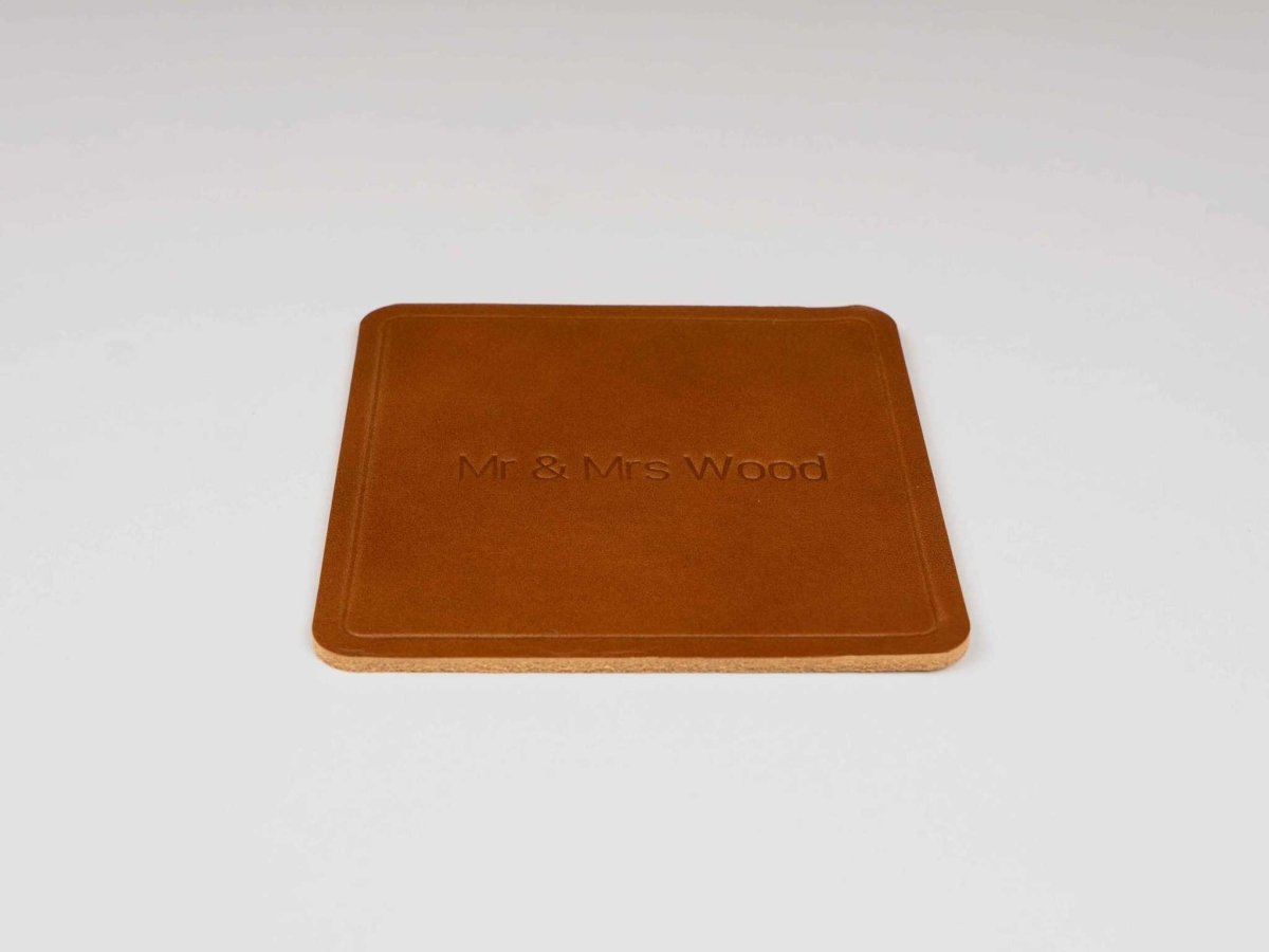 Personalized square leather coaster with custom engraving on premium Italian leather