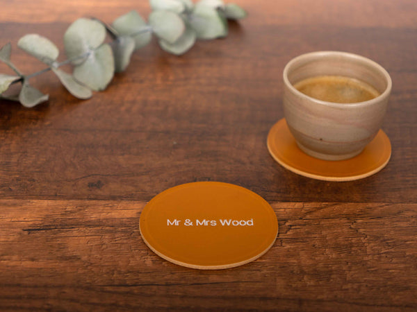 personalized leather coaster on a table